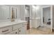 Bathroom featuring double vanity, tile flooring, and modern decor at 4511 Bridgeway Rd, Atlanta, GA 30331