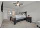 Comfortable bedroom featuring a ceiling fan, and carpet floors at 4511 Bridgeway Rd, Atlanta, GA 30331