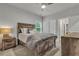 Cozy bedroom with rustic wood furniture and plenty of natural light at 4511 Bridgeway Rd, Atlanta, GA 30331