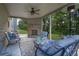 Covered patio features a fireplace and patio furniture at 4511 Bridgeway Rd, Atlanta, GA 30331