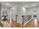 Hallway featuring hardwood floors and a staircase at 4511 Bridgeway Rd, Atlanta, GA 30331