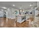 Spacious kitchen featuring an island with granite countertop and pendant lighting at 4511 Bridgeway Rd, Atlanta, GA 30331