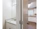 Half bath featuring a granite countertop and faucet at 6590 Smoke Ridge Dr, Atlanta, GA 30349
