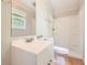 Well-lit bathroom featuring a shower, toilet, vanity and neutral finishes at 3551 Cindy Way, Rex, GA 30273