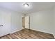 Bedroom featuring wood-look flooring and a closet at 3551 Cindy Way, Rex, GA 30273