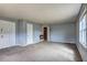 Living room with two doorways at 6191 Cumming Hwy, Canton, GA 30115