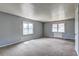 Living room with two windows offering natural light at 6191 Cumming Hwy, Canton, GA 30115