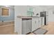 Bright kitchen features stainless steel appliances, granite countertops, and ample cabinet space at 6802 Ida St, Lithonia, GA 30058