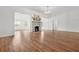 Inviting living space featuring a stone fireplace and hardwood floors at 6802 Ida St, Lithonia, GA 30058