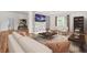 Inviting living room with modern decor, wood floors, and a stone-accented wall at 6802 Ida St, Lithonia, GA 30058