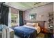 Serene bedroom featuring a large window with natural light and neutral decor at 800 Peachtree Ne St # 1014, Atlanta, GA 30308