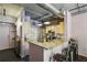 Open kitchen with breakfast bar and stainless steel appliances at 800 Peachtree Ne St # 1014, Atlanta, GA 30308