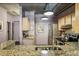 Kitchen with granite counters and ample cabinet space at 800 Peachtree Ne St # 1014, Atlanta, GA 30308