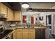 Functional kitchen featuring granite countertops and stainless steel appliances at 800 Peachtree Ne St # 1014, Atlanta, GA 30308