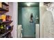 Efficient laundry room with washer, dryer, and storage shelves at 800 Peachtree Ne St # 1014, Atlanta, GA 30308