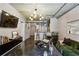 Stylish living area with concrete floors, exposed ductwork, and comfortable modern furnishings at 800 Peachtree Ne St # 1014, Atlanta, GA 30308