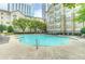 Inviting community pool with lounge chairs and landscaped surroundings, perfect for relaxation at 800 Peachtree Ne St # 1014, Atlanta, GA 30308