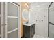 Chic bathroom featuring updated fixtures, modern lighting, and walk-in shower at 999 Smith Sw St, Atlanta, GA 30310