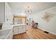 Open kitchen featuring modern island, sleek countertops, with living area at 999 Smith Sw St, Atlanta, GA 30310