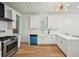 Updated kitchen featuring white cabinetry, modern appliances, and stainless steel gas range at 999 Smith Sw St, Atlanta, GA 30310