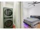 Laundry area with full size washer and dryer adjacent to bedroom at 999 Smith Sw St, Atlanta, GA 30310