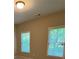 Sunlit bedroom features two windows with blinds at 261 Cole Ne St, Marietta, GA 30060