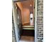 View of the foyer with hardwood floors, open doorway, and clear sightlines at 261 Cole Ne St, Marietta, GA 30060