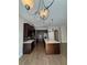 Kitchen featuring stainless steel appliances, wooden cabinets and granite counters at 261 Cole Ne St, Marietta, GA 30060