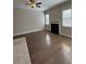 Bright living room featuring hardwood floors and a modern fireplace at 261 Cole Ne St, Marietta, GA 30060