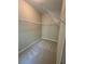 Walk-in closet with carpet flooring and wire shelving at 261 Cole Ne St, Marietta, GA 30060