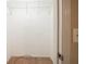 Empty closet featuring shelving and carpet flooring at 5310 Arrowind Nw Rd, Lilburn, GA 30047