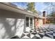 Backyard view featuring a patterned patio area and the home's exterior at 1415 Dalewood Ne Dr, Atlanta, GA 30329