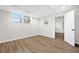 Finished basement room featuring new flooring and natural light at 1415 Dalewood Ne Dr, Atlanta, GA 30329
