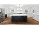 Modern kitchen featuring a large island, stainless steel appliances, and white subway tile backsplash at 1415 Dalewood Ne Dr, Atlanta, GA 30329