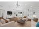 Bright living room features vaulted ceiling, fireplace, built-in shelving, and hardwood floors at 1415 Dalewood Ne Dr, Atlanta, GA 30329