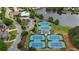 Recreation area featuring six well-maintained tennis courts, a pool, a lake, and a clubhouse at 1805 Hunters Moon Dr, Alpharetta, GA 30005