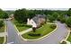 A large 2-story house sits on a manicured corner lot, and has great curb appeal at 1805 Hunters Moon Dr, Alpharetta, GA 30005