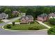 This house is situated on a landscaped lot in a suburban neighborhood filled with mature trees at 1805 Hunters Moon Dr, Alpharetta, GA 30005