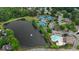 A large pond sits adjacent to tennis courts, a clubhouse and a pool in this community's recreation area at 1805 Hunters Moon Dr, Alpharetta, GA 30005