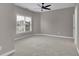 Bedroom features a large window with blinds and neutral walls at 1805 Hunters Moon Dr, Alpharetta, GA 30005