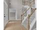 Open foyer with staircase, hardwood floors, and natural light at 1805 Hunters Moon Dr, Alpharetta, GA 30005