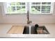 Close up of modern kitchen sink and counter at 1805 Hunters Moon Dr, Alpharetta, GA 30005