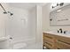 Modern bathroom with black hardware, tub, and vanity at 3021 Mills Ridge Dr, Canton, GA 30114