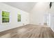 Open concept living room featuring lots of natural light, new flooring and a soaring ceiling at 3021 Mills Ridge Dr, Canton, GA 30114