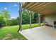 Spacious backyard with a concrete patio perfect for outdoor entertainment and relaxation at 322 Woodridge Pass, Canton, GA 30114