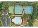Overhead aerial view of the community pool, tennis courts, basketball court, and playground area at 322 Woodridge Pass, Canton, GA 30114