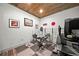 Dedicated exercise room features gym equipment and wall decor for at-home fitness at 322 Woodridge Pass, Canton, GA 30114