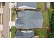 Aerial view of a home's roof, driveway, and landscaping in a suburban neighborhood at 322 Woodridge Pass, Canton, GA 30114