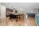 Spacious kitchen with a large island, stainless steel appliances, and open layout to the living area at 322 Woodridge Pass, Canton, GA 30114