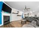 Stylish living area with fireplace, wood floors, and modern decor providing comfortable and inviting living at 322 Woodridge Pass, Canton, GA 30114